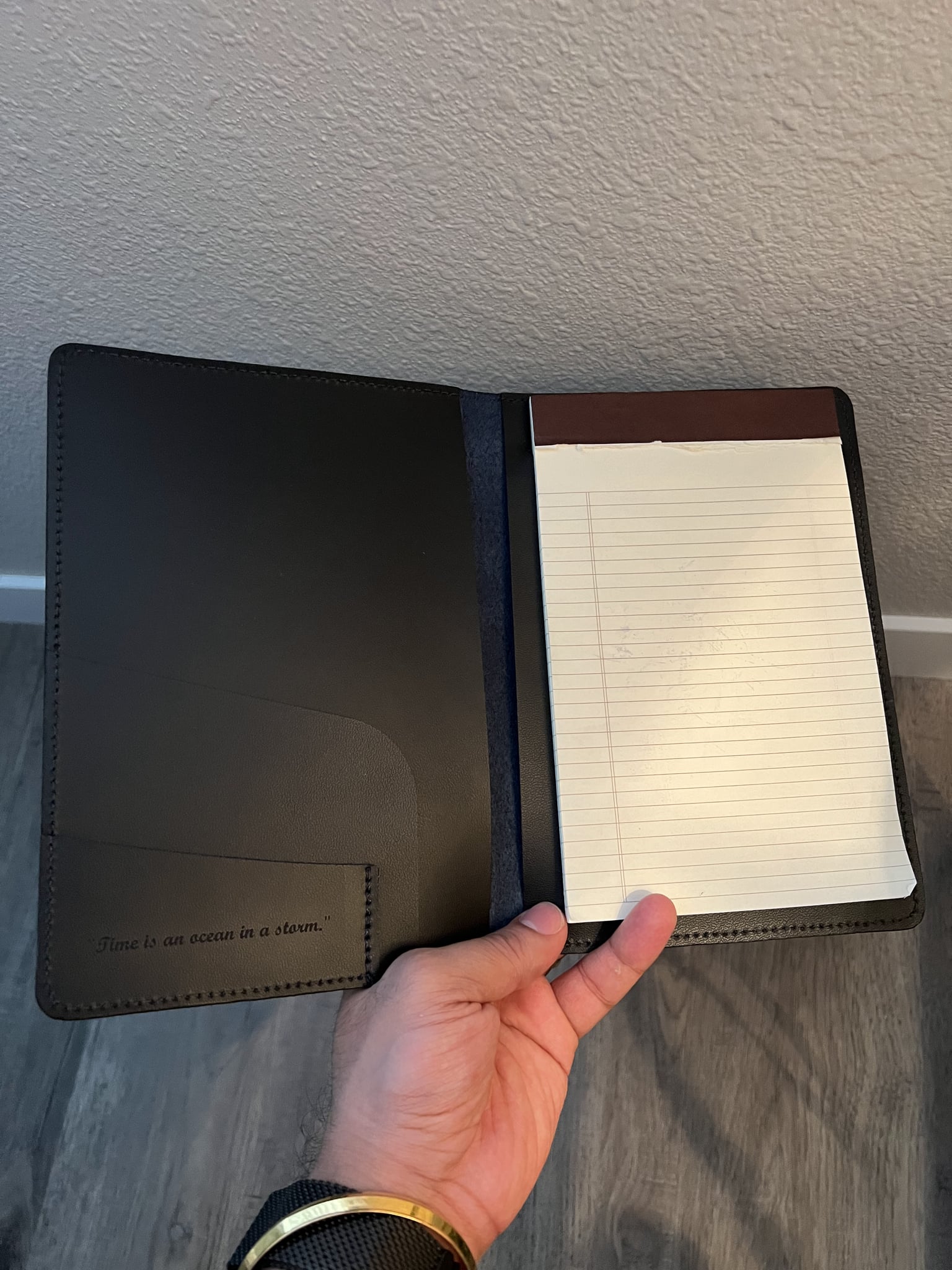 Inside view of the portfolio cover. I got a quote etched from one of my favorite pieces of media.